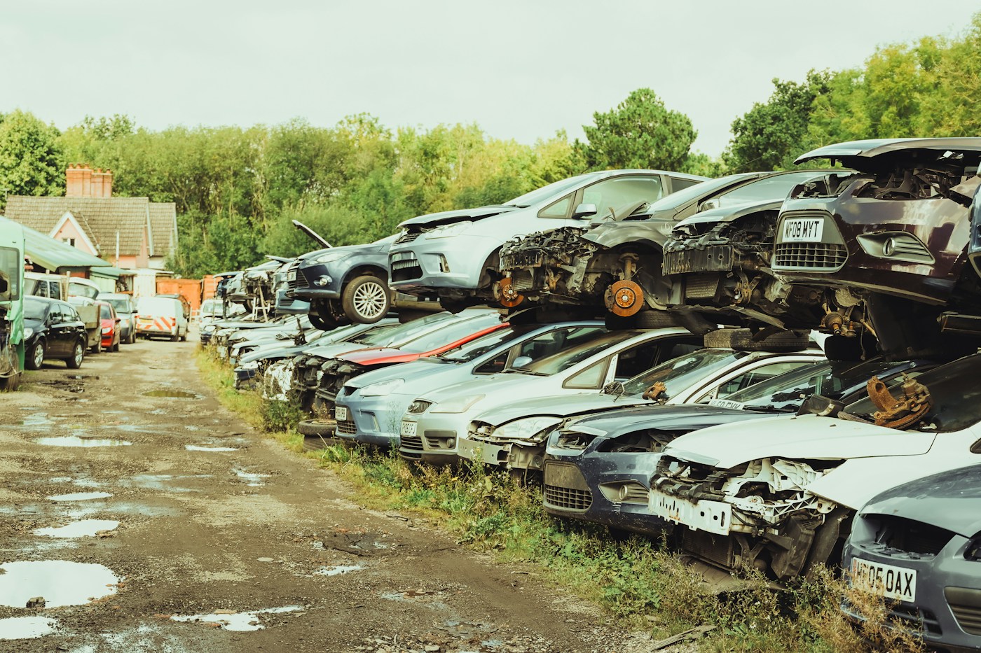 Rusty old junk car ready for scrap removal